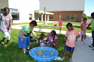 Students participating in sensory tactile activity