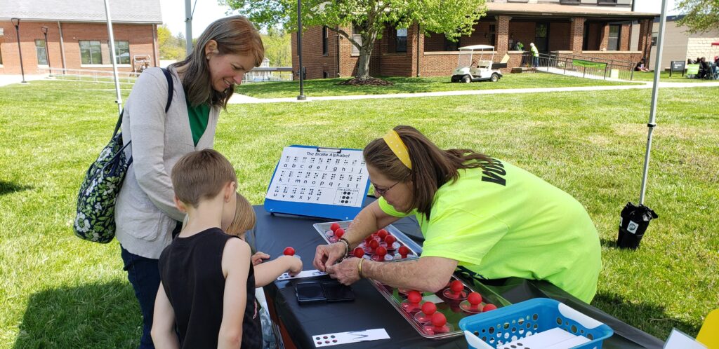 children making braille crafts