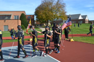 MSB soccer team walking to the field