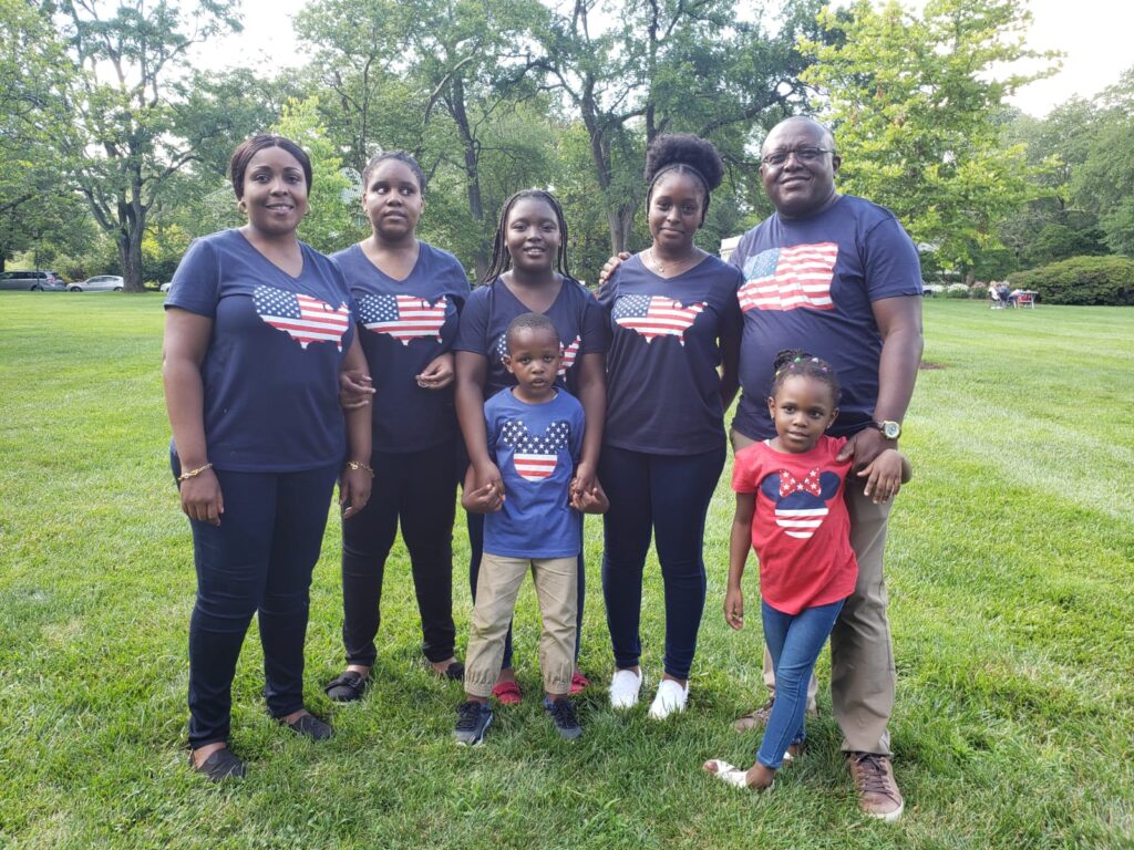 Seven family members wearing matching T-shirts