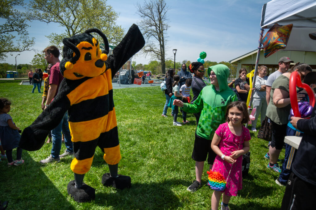The MSB Bee greets children at the See Beyond Festival.